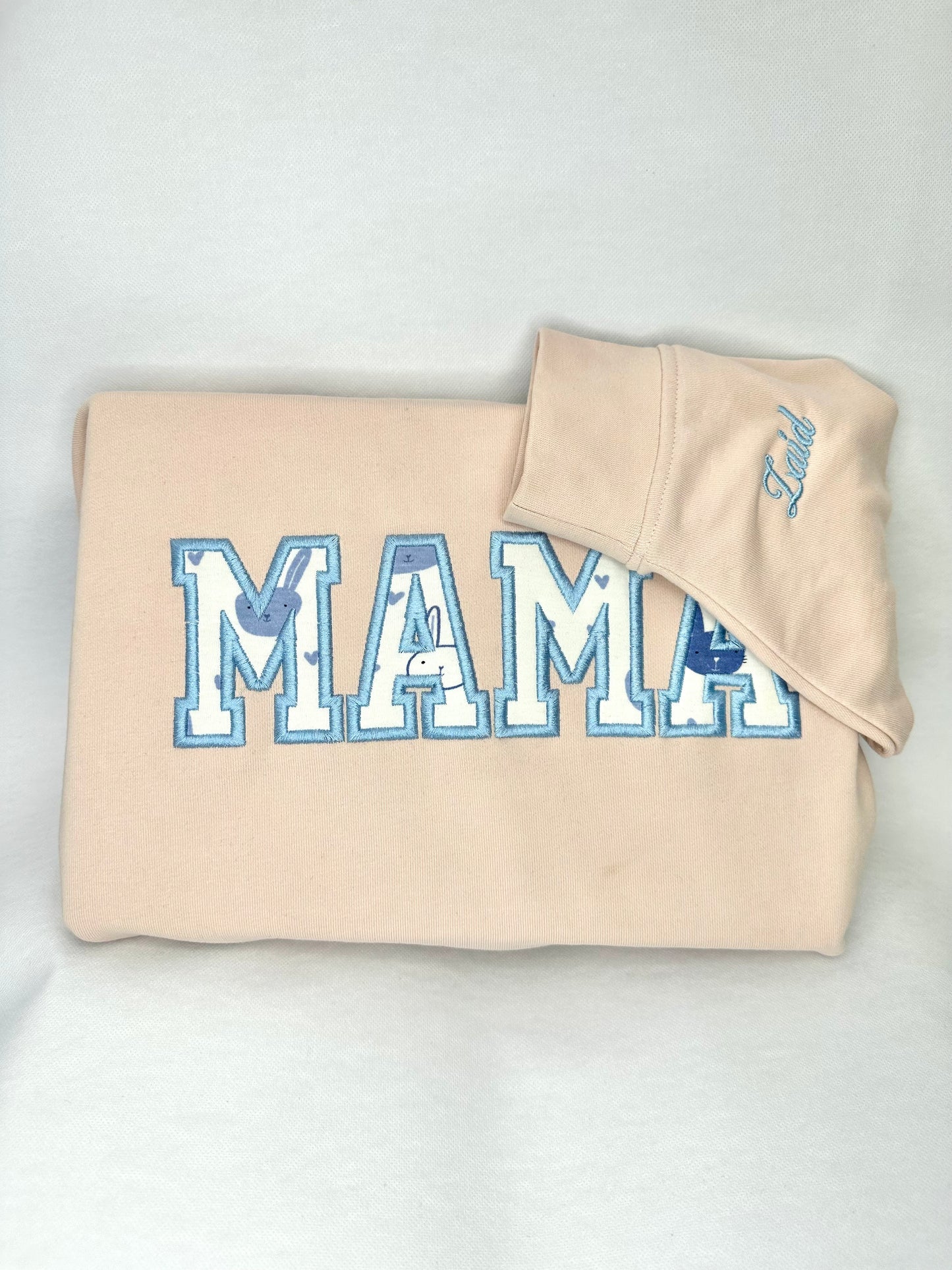 Mamma hoodie med ditt barns plagg